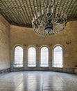 Interior of Agha El-Selehdar SabilÃÂ with iron ornate windows, white marble floor, and huge chandelier, Cairo, Egypt